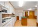 The kitchen with stainless appliances and a center island at 1504 N Knightstown Rd, Shelbyville, IN 46176