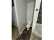 Bathroom with modern tile flooring, toilet, and stone accent wall at 2307 Blackthorn Dr, Franklin, IN 46131