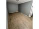 This bedroom features plush carpeting and neutral-colored walls at 2307 Blackthorn Dr, Franklin, IN 46131