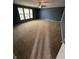 Large bedroom features plush carpeting, ceiling fan and three windows at 2307 Blackthorn Dr, Franklin, IN 46131
