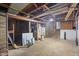 Unfinished basement space showing exposed ceiling and structural elements at 327 Central Ave, Anderson, IN 46012