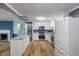 Bright kitchen with stainless steel appliances, granite countertops, and stylish backsplash at 327 Central Ave, Anderson, IN 46012
