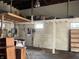 Spacious unfinished basement featuring painted block walls and a small window at 850 N Anderson St, Elwood, IN 46036
