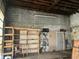 Unfinished basement with block walls, shelves, and exposed ceiling at 850 N Anderson St, Elwood, IN 46036