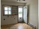 Living room space featuring windows and built-in shelves at 850 N Anderson St, Elwood, IN 46036