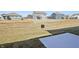 View from the back of the house, featuring a green lawn and other new homes at 6286 Wasco Dr, Whitestown, IN 46075
