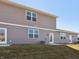 View of the back of the house, with multiple windows and doors at 6286 Wasco Dr, Whitestown, IN 46075
