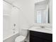 A full bathroom with a shower-tub, toilet, and vanity with dark wood cabinets at 6286 Wasco Dr, Whitestown, IN 46075