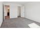 Spacious bedroom featuring neutral carpet and a walk-in closet for ample storage space at 6286 Wasco Dr, Whitestown, IN 46075