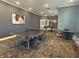 The game room features a ping pong table and foosball table for fun and recreation at 6286 Wasco Dr, Whitestown, IN 46075