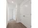Hallway features carpet and white doors at 6286 Wasco Dr, Whitestown, IN 46075