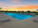 Stunning sunset view of the community swimming pool and lounge area at 6286 Wasco Dr, Whitestown, IN 46075