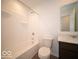 A full bathroom with shower/tub, dark vanity, and a matching framed mirror at 6296 Wasco Dr, Whitestown, IN 46075