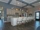 Community clubhouse kitchen with island and bar seating at 6296 Wasco Dr, Whitestown, IN 46075