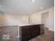 The kitchen island includes a sink, dishwasher, and modern cabinets at 6296 Wasco Dr, Whitestown, IN 46075