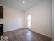 A bright, open floorplan connects the dining area with a glass paneled door to the outdoors at 6296 Wasco Dr, Whitestown, IN 46075