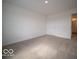 Spacious bedroom with neutral carpet and an ensuite bathroom entrance at 6304 Wasco Dr, Whitestown, IN 46075