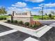 Trailside community entrance with landscaping and signage, showcasing curb appeal at 6304 Wasco Dr, Whitestown, IN 46075