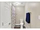 Bathroom with a tub, shower, vanity, neutral walls and decorative luxury vinyl plank flooring at 2747 E Midland Rd, Indianapolis, IN 46227