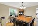Bright dining area featuring a charming table and a built-in hutch for added storage at 2747 E Midland Rd, Indianapolis, IN 46227