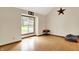 Bright living room with hardwood floors, a large window, and a cozy atmosphere at 2747 E Midland Rd, Indianapolis, IN 46227
