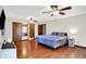 Large main bedroom with hardwood floors and a ceiling fan at 2747 E Midland Rd, Indianapolis, IN 46227