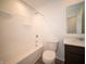 Bathroom featuring shower over tub and laminate floors at 6314 Wasco Dr, Whitestown, IN 46075