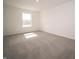 Bedroom with neutral carpet, white walls and natural light at 6314 Wasco Dr, Whitestown, IN 46075