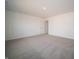 Spacious bedroom with carpet, white walls, and closet at 6314 Wasco Dr, Whitestown, IN 46075
