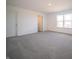 Spacious bedroom with carpet, large window, and closet at 6314 Wasco Dr, Whitestown, IN 46075