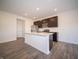 Bright kitchen with stainless appliances, recessed lighting, and modern white countertops at 6314 Wasco Dr, Whitestown, IN 46075