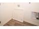 Laundry area with hookups on light gray laminate flooring at 6314 Wasco Dr, Whitestown, IN 46075