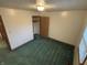 Bedroom with green carpet, a window, closet and neutral walls for versatile decorating at 8855 N Waverly Park Rd, Martinsville, IN 46151