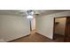 Bedroom with carpeted floors, and a closet with wood trim doors at 8855 N Waverly Park Rd, Martinsville, IN 46151