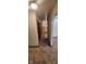 Hallway leading to kitchen area with carpeted floors at 8855 N Waverly Park Rd, Martinsville, IN 46151