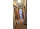 Hallway featuring carpeted floors and wooden trim doorways leading to other rooms at 8855 N Waverly Park Rd, Martinsville, IN 46151