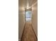 Hallway featuring carpet and leading to the living room with neutral paint at 8855 N Waverly Park Rd, Martinsville, IN 46151