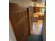 Hallway view leading to the kitchen featuring wooden cabinets and countertop at 8855 N Waverly Park Rd, Martinsville, IN 46151
