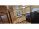 Well-lit kitchen with butcher-block countertops, white cabinets, a stainless-steel sink, and a black range at 8855 N Waverly Park Rd, Martinsville, IN 46151