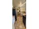 Spacious kitchen with butcher-block countertops, white cabinetry, and stainless steel appliances at 8855 N Waverly Park Rd, Martinsville, IN 46151