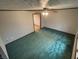 The living room features green carpet and trim at 8855 N Waverly Park Rd, Martinsville, IN 46151