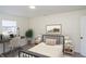 Comfortable bedroom featuring a desk area, neutral color scheme, and bright natural light at 2068 S Avon Ave, Avon, IN 46123