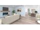 Cozy living room with fireplace and adjacent dining area with seating for six at 2068 S Avon Ave, Avon, IN 46123