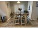 Cozy dining area with a wooden table, stylish chairs, and a decorative rug at 2018 Abbey Ln, Columbus, IN 47201