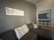Stylish living room featuring elegant butterfly wall decor and media center at 2018 Abbey Ln, Columbus, IN 47201