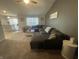Open-concept living space with seamless flow into the adjacent dining area at 2018 Abbey Ln, Columbus, IN 47201