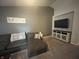 Comfortable living room with a large sectional sofa and inviting ambiance at 2018 Abbey Ln, Columbus, IN 47201