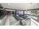 Stylish common area with modern furnishings, tile flooring, and plenty of natural light at 4000 N Meridian St # 14A, Indianapolis, IN 46208