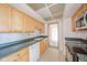 Charming kitchen featuring light wood cabinets, modern appliances, and ample counter space at 4000 N Meridian St # 14A, Indianapolis, IN 46208