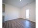 Bright dining area with a door that leads to a backyard at 7888 Magnolia St, New Palestine, IN 46163